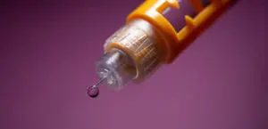 A close-up photo of an insulin syringe for type 1 diabetes treatment.