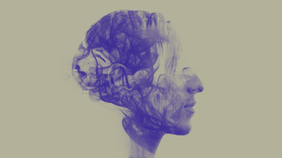 An artistic image of a head filled with smoke.
