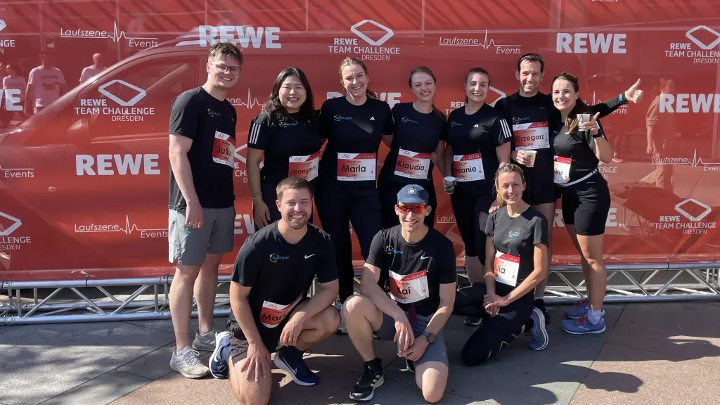 a group photo of people after marathon